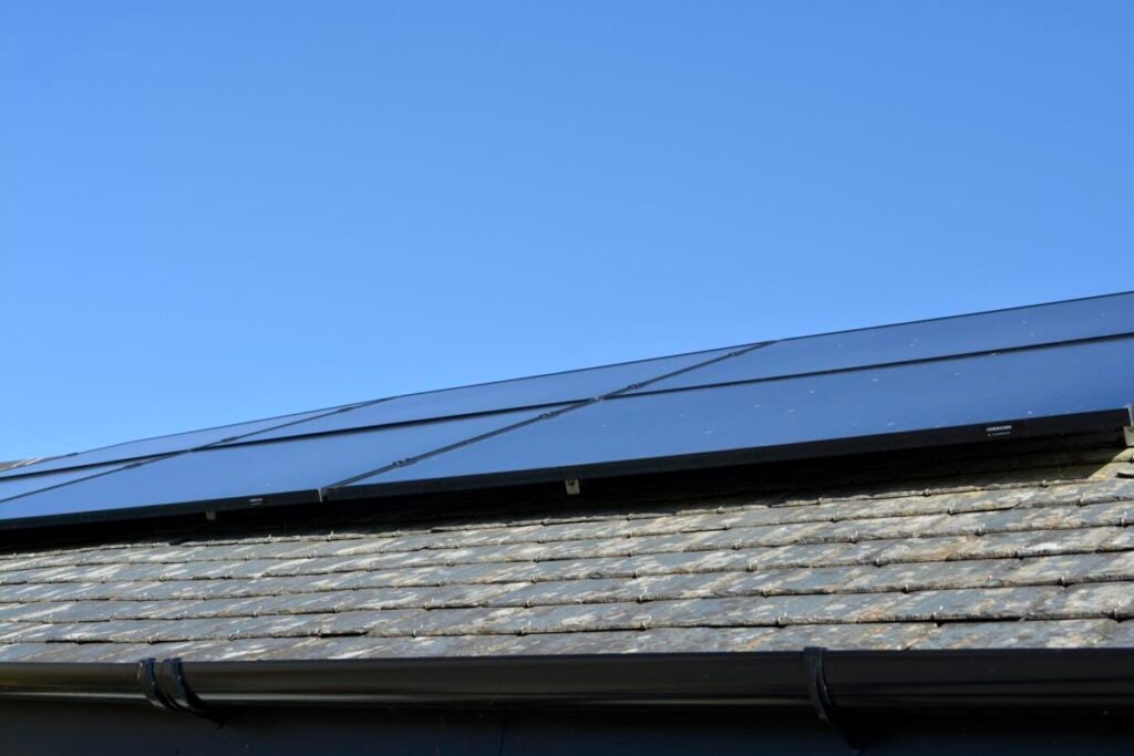 solar panels on a rooftop under a blue sky