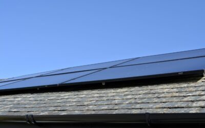 solar panels on a rooftop under a blue sky